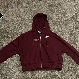 Nike air cropped zip up with thick band at bottom for cropped look  Marron color